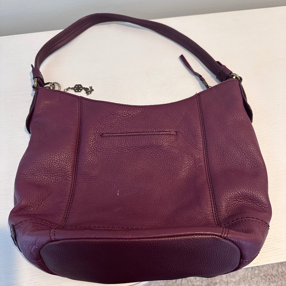 The Sak Plum Purple Pebbled Leather Shoulder Bag Hobo Purse Antique Brass Charm